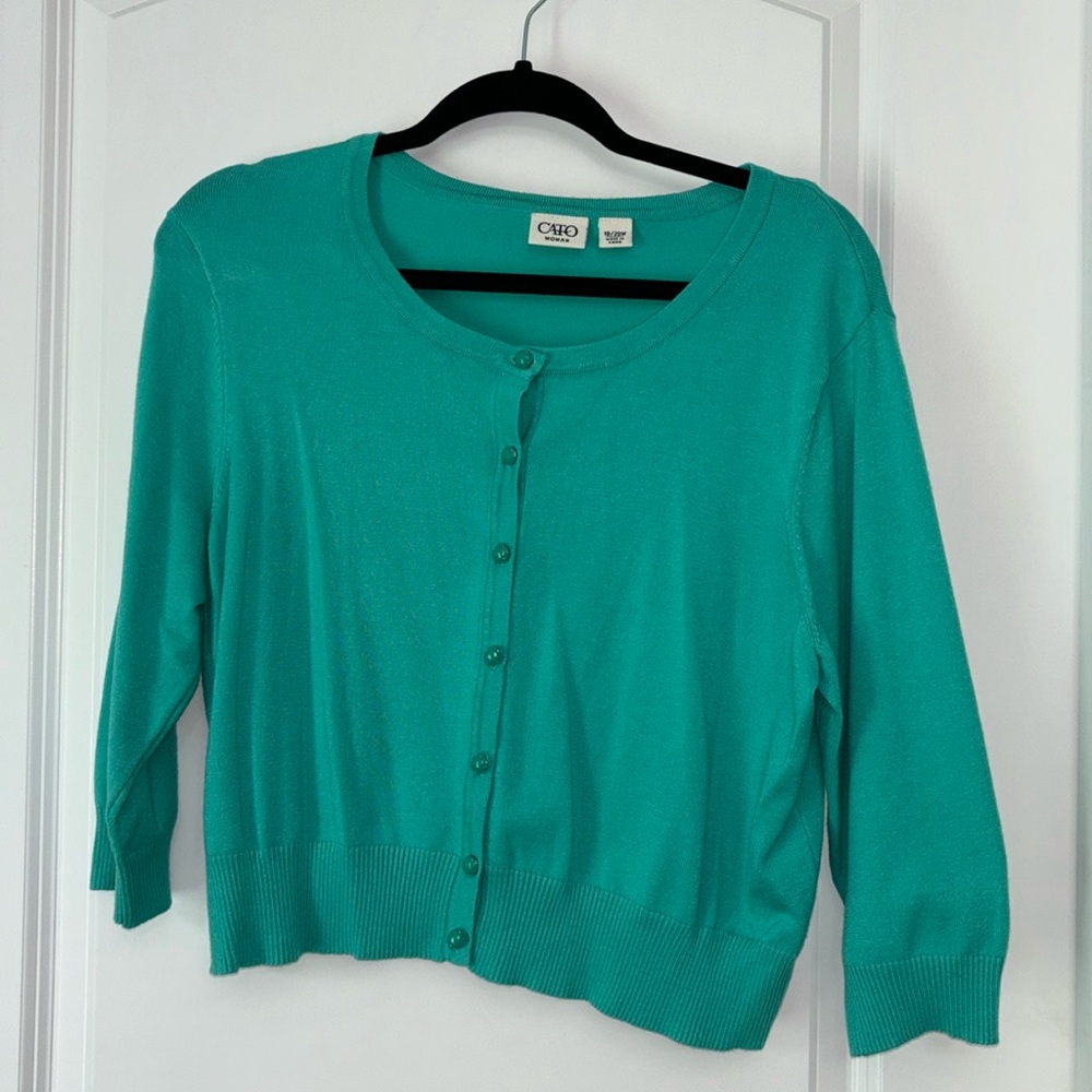 Beautiful sea green colored sweater from Cato’s. Like new condition!
